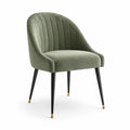 Chaise en velours vert avec pieds en métal noir